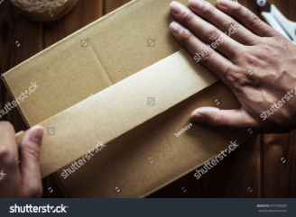 Image of water-activated tape sealing a corrugated shipping box.